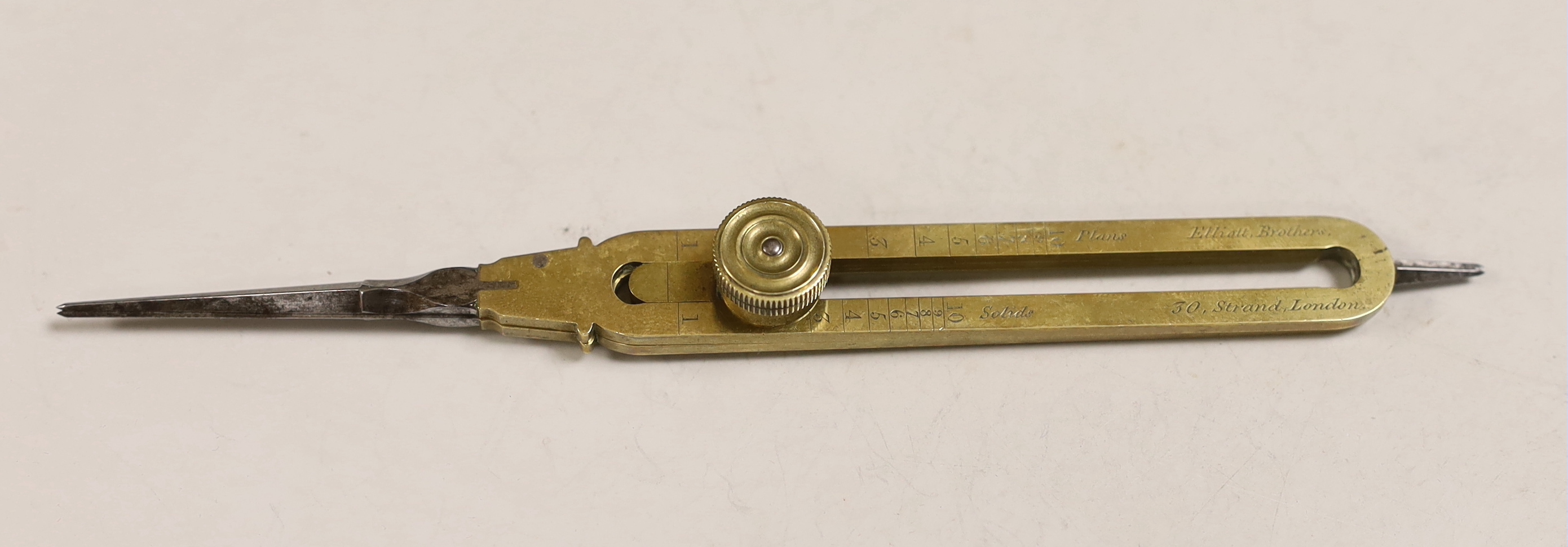 A 19th century brass and steel proportional compasses, Elliott Bros., 30 The Strand, engraved WCC, 15th Regt (East Yorks Regiment), in morocco case